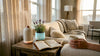 Essential oil diffuser on side table in cozy living room
