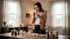 Woman testing scent of mass-produced candle in workshop