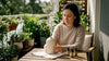 Woman adjusting essential oil diffuser at home