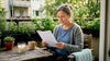 Woman reading article about endocrine disruptors from candles