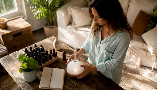 Aromatherapist setting up essential oil diffuser