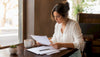 Woman reviewing fragrance ingredient document