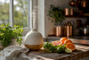 Diffuser releasing citrus fragrance in modern room