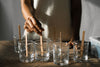 woman making candles