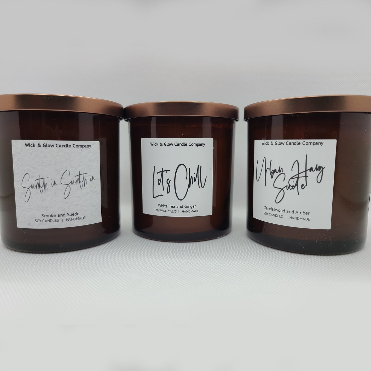 Candles in brown jars