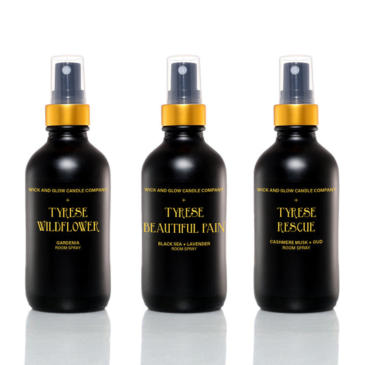 three black bottles of sprays with different scents: gardenia spray, black sea and lavender, cashmere musk and oud
