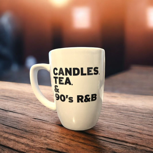 Candles Tea and 90's R&B-themed ceramic mug on wooden table.