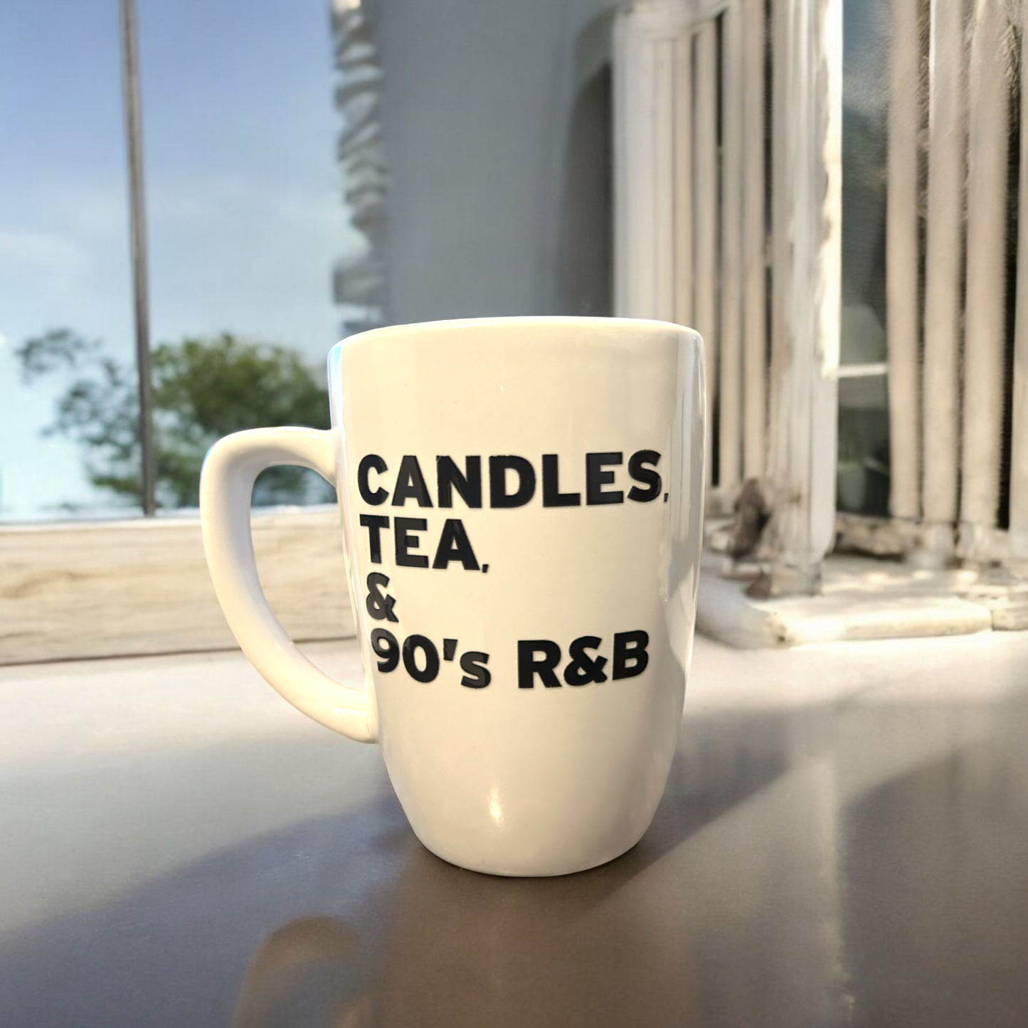 Candles, Tea, and 90's R&B mug on windowsill