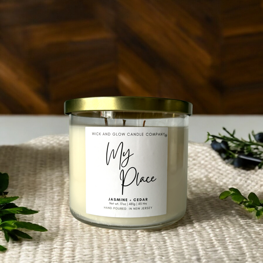 My Place candle with a gold lid on a table cloth