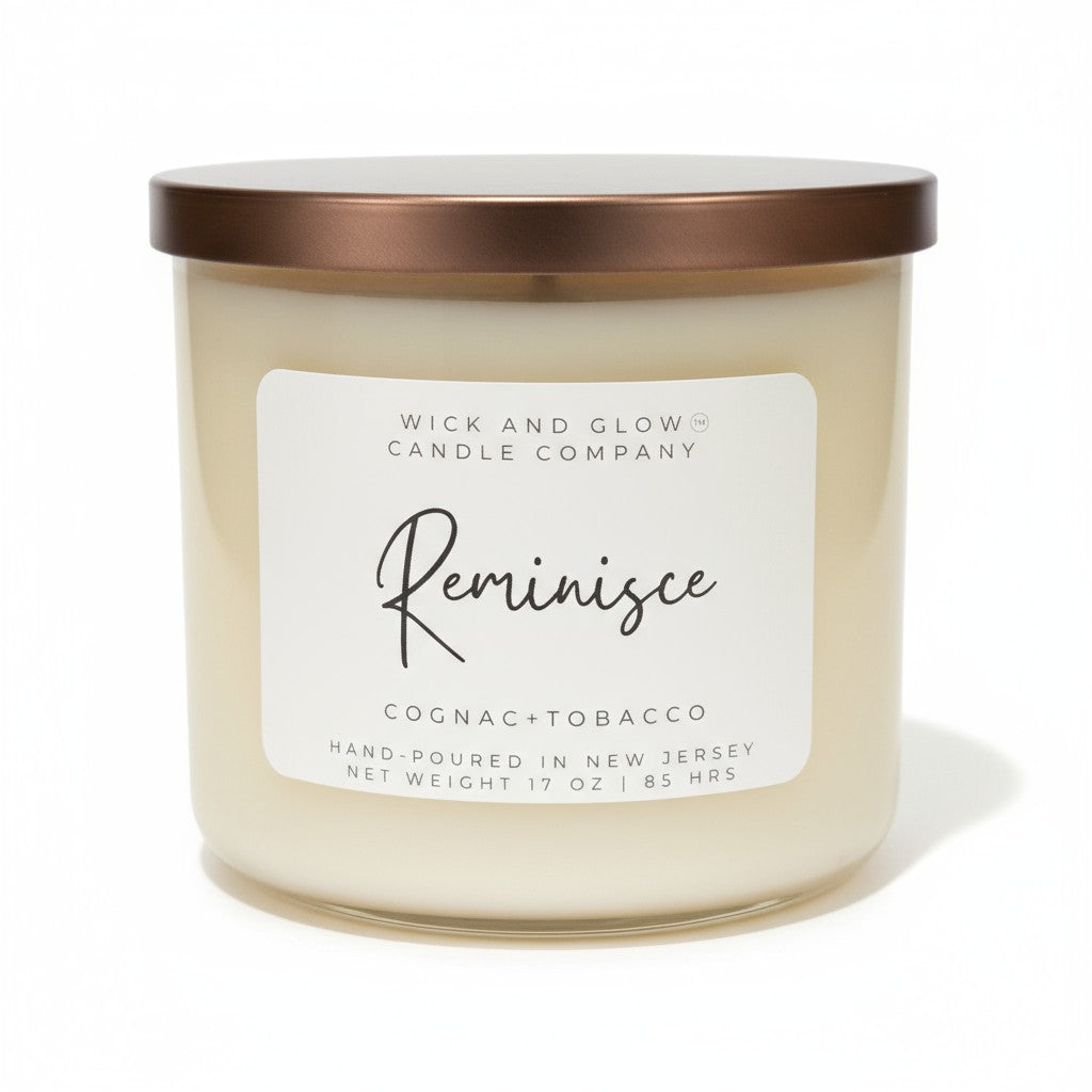 Cognac and Tobacco white candle with a bronze lid on a white background by Wick and Glow