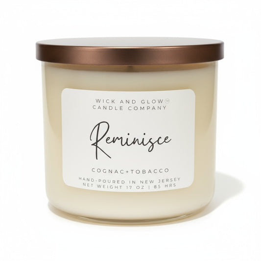 Cognac and Tobacco white candle with a bronze lid on a white background by Wick and Glow