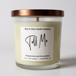 Candle with a copper lid and 'Wick & Glow Candle Company' label on a white background