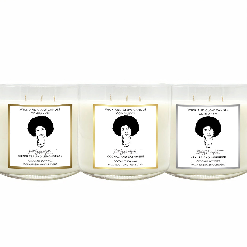 3 candles in clear jars, with labels that state Betty Wright Limited Candle Collection